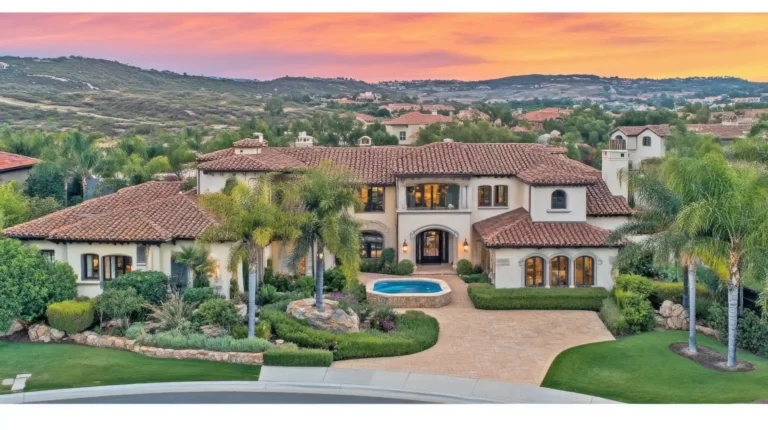 Mediterranean estate with a pool at sunset
