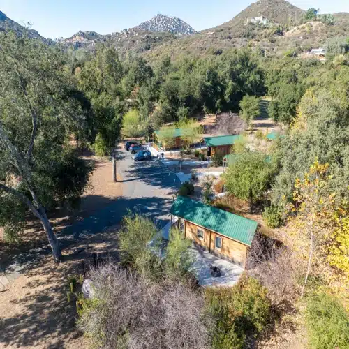 Cabins among the trees in the San Diego backcountry