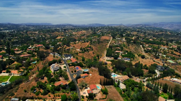 Rural homes among rolling hills