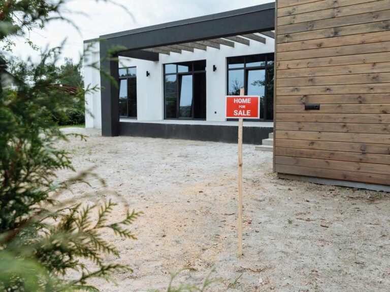 Modern California home with a for sale sign
